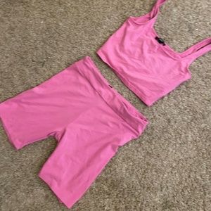Matching tank and shorts in bright pink